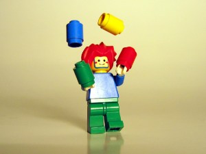 lego figure juggling blocks